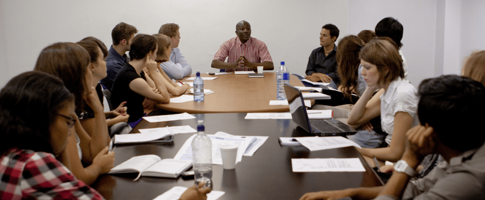 Teen participants gather for a meeting on a human rights project